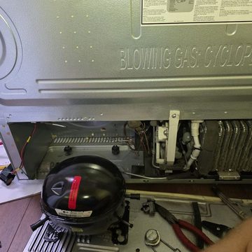 Compressor replacement during refrigerator repair