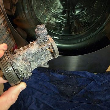 Front-load washer drain pump filter during repair